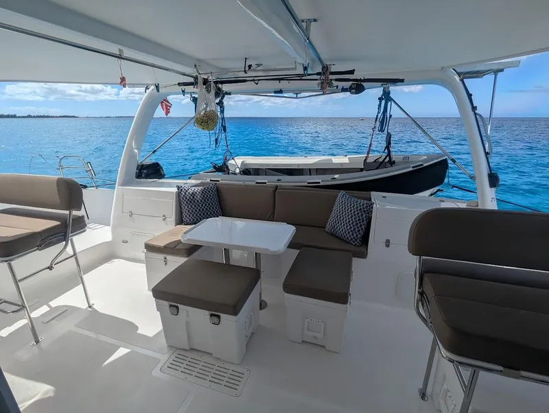 Slide: The Image of Seawind 1260 catamaran interior, 2020 model, with seating and ocean view. - 8