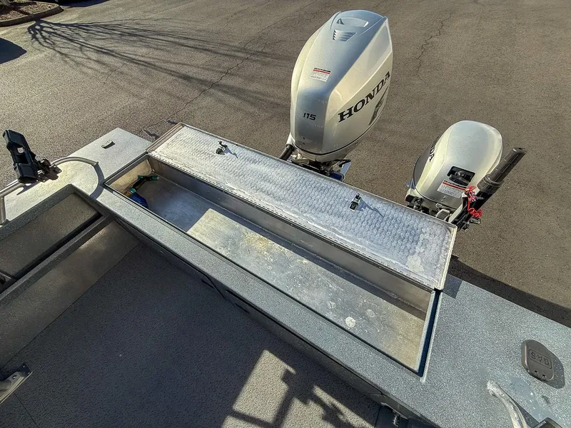 Slide: The Image of 2011 Pro-Steelheader 18 Sea Predator OS boat with Honda outboard motors. - 19