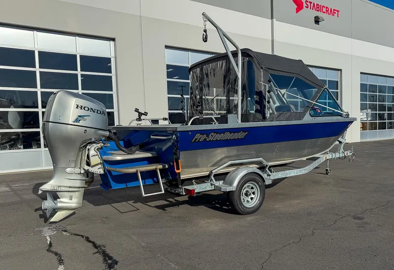 Slide: The Image of 2011 Pro-Steelheader 18 Sea Predator OS boat with Honda outboard motor on trailer. - 3