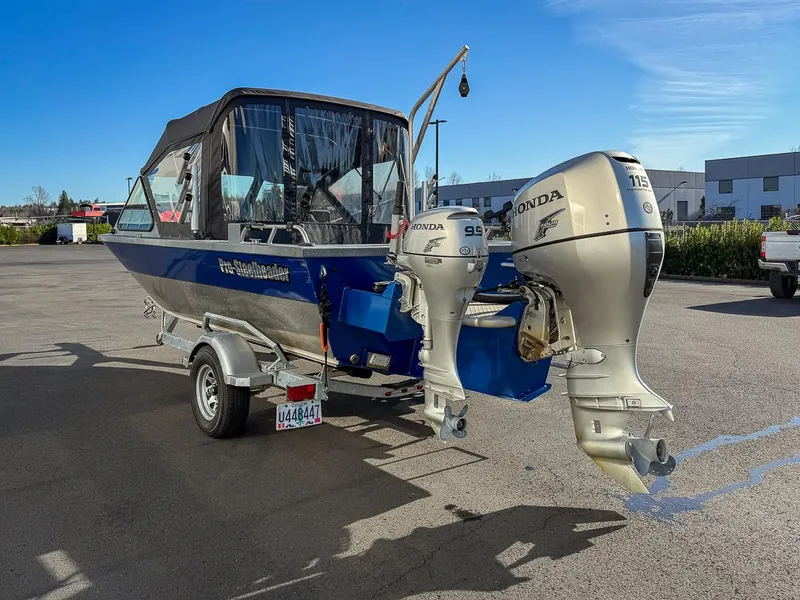 Slide: The Image of 2011 Pro-Steelheader 18 Sea Predator OS boat with dual Honda outboard motors. - 5