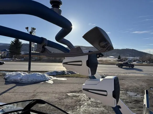 Slide: The Image of 2025 Malibu M230 boat speakers and tower against a sunny, mountainous backdrop. - 18