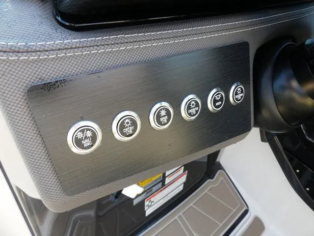 Slide: The Image of Control panel of a 2025 Monterey 255SS boat with labeled buttons. - 21