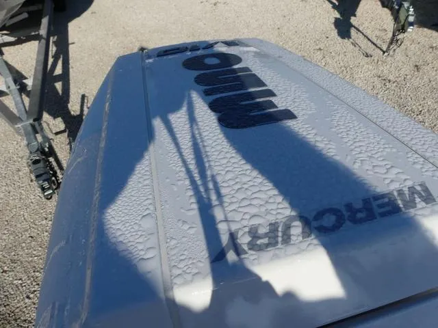 Slide: The Image of 2025 Monterey 255SS boat with Mercury engine, showing water droplets on the surface. - 23