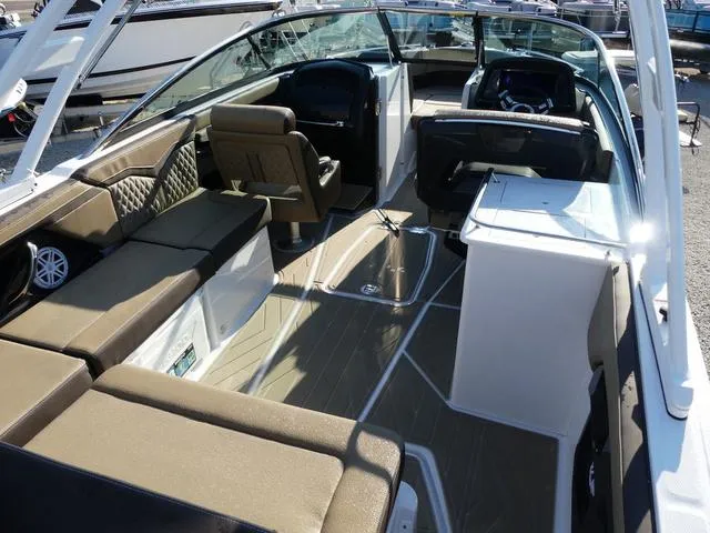 Slide: The Image of 2025 Monterey 255SS boat interior with luxurious seating and modern design. - 8