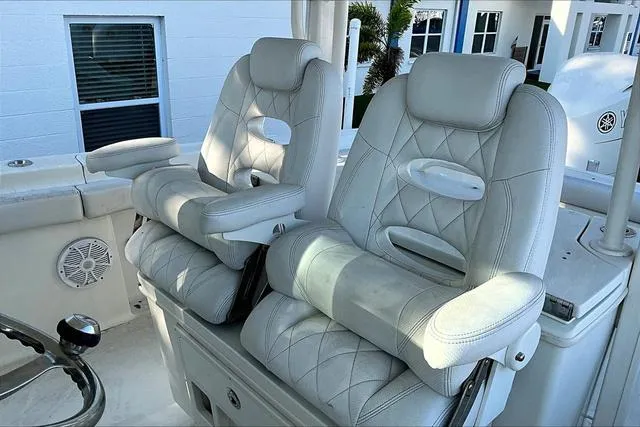 Slide: The Image of 2016 Hydra-Sports 3400 CC boat with luxurious white leather seats. - 13