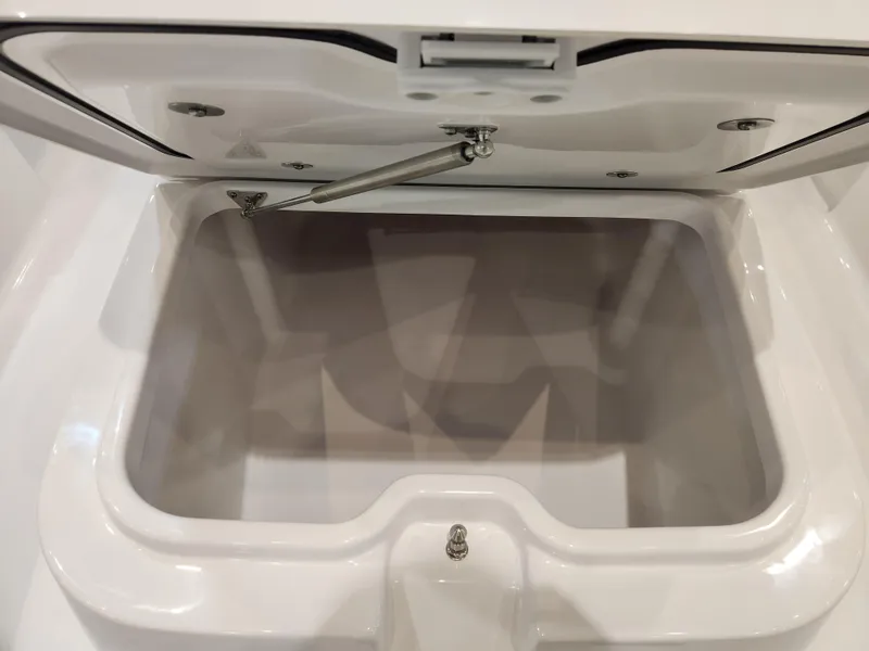 Slide: The Image of Open storage compartment on 2025 Sportsman Masters 267OE Bay Boat. - 7