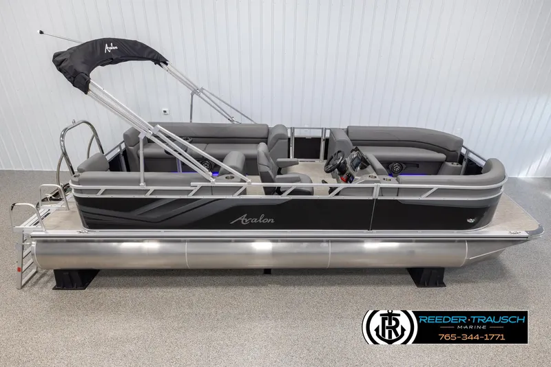 Slide: The Image of 2025 Avalon VLS QL pontoon boat with sleek design and comfortable seating. - 1