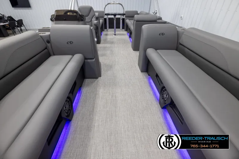Slide: The Image of 2025 Avalon VLS QL interior with gray seating and blue LED lighting. - 14
