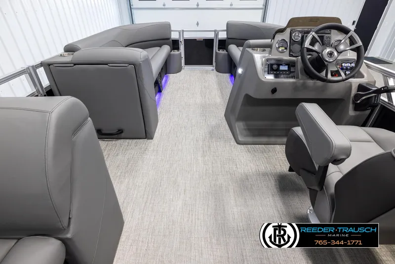 Slide: The Image of Interior of 2025 Avalon VLS QL boat with modern seating and steering console. - 18