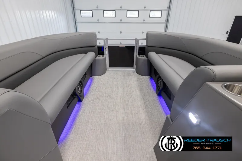 Slide: The Image of Luxurious interior of 2025 Avalon VLS QL pontoon boat with LED lighting and plush seating. - 19