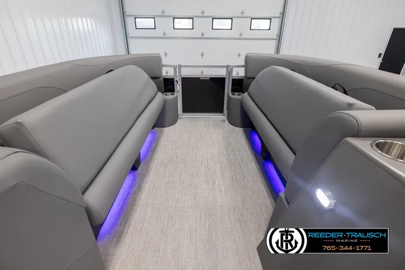 Slide: The Image of 2025 Avalon VLS QL interior with gray seating and blue LED lighting. - 20