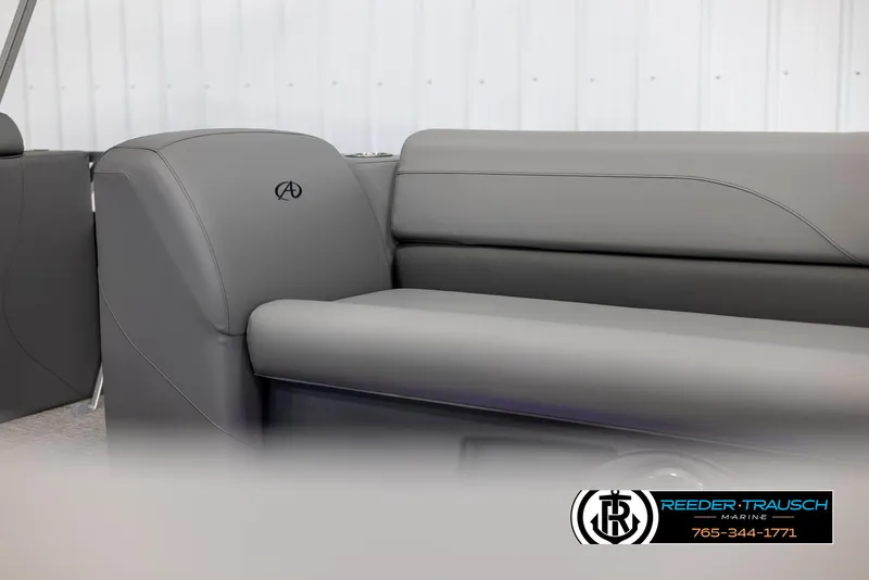 Slide: The Image of 2025 Avalon VLS QL boat interior with sleek gray seating and logo. - 39