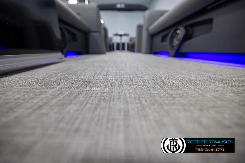 Slide: The Image of Interior view of 2025 Avalon VLS QL with modern seating and blue LED lighting. - 43