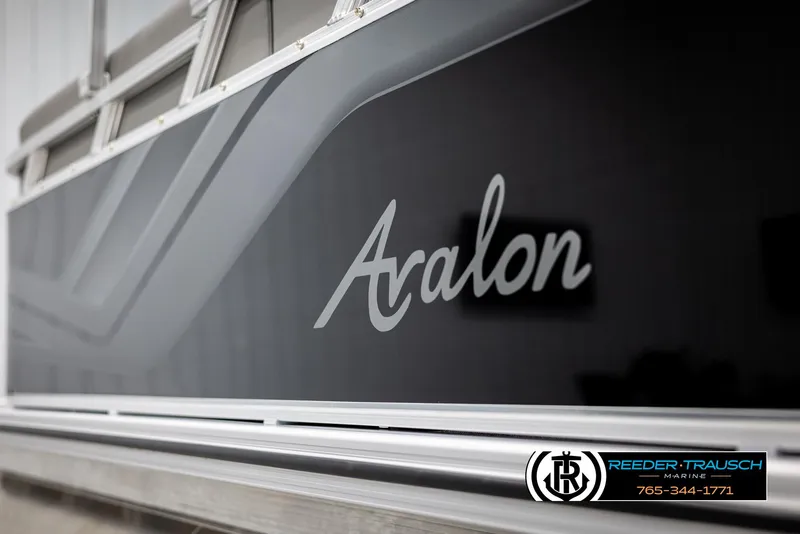 Slide: The Image of 2025 Avalon VLS QL boat side view with logo and dealership branding. - 44