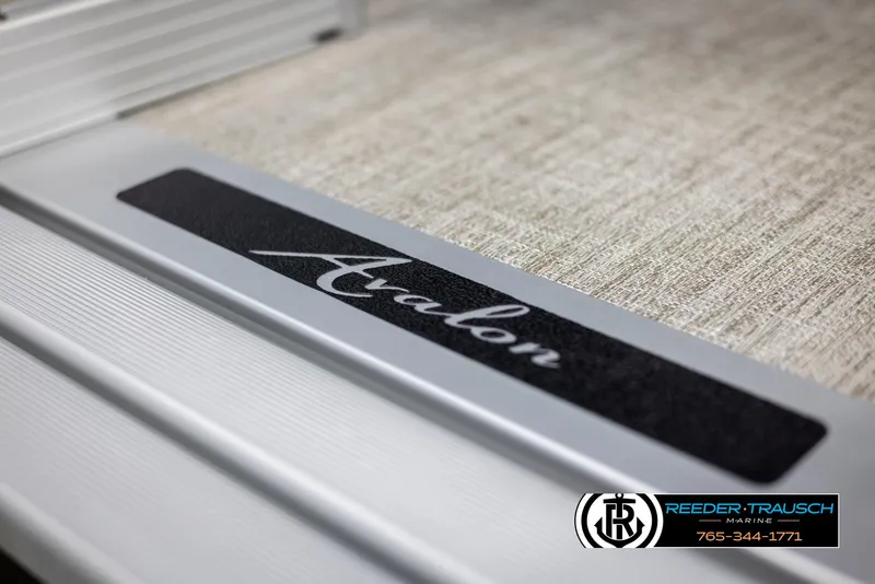 Slide: The Image of 2025 Avalon VLS QL logo on textured surface, featuring Reeder-Trausch Marine branding. - 48