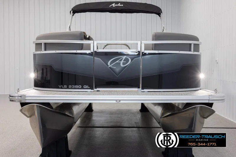 Slide: The Image of Avalon VLS QL 2025 pontoon boat in showroom, featuring sleek design and modern aesthetics. - 9