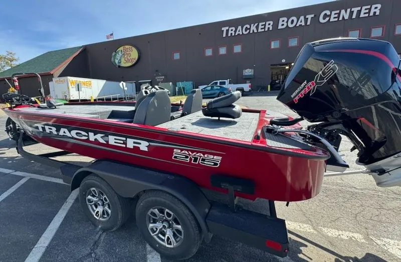 Slide: The Image of 2025 Tracker Savage 215 boat at Tracker Boat Center parking lot. - 6