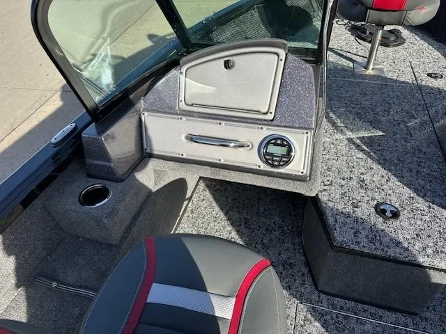 Slide: The Image of 2025 Ranger VS1882SC Angler boat interior with seating and dashboard details. - 5