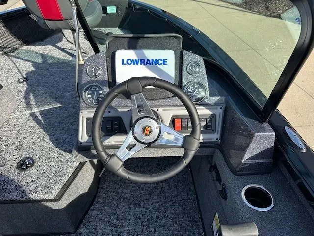 Slide: The Image of 2025 Ranger VS1882SC Angler boat dashboard with Lowrance display and steering wheel. - 6