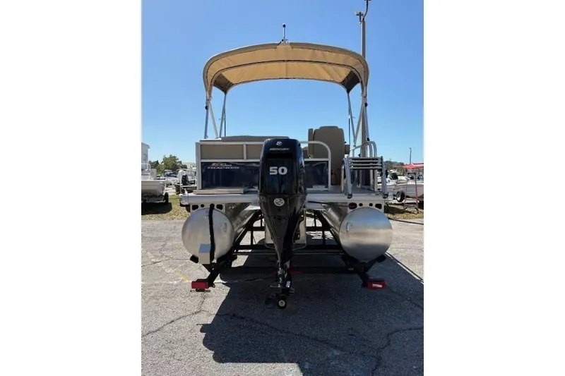 Slide: The Image of 2025 Sun Tracker Bass Buggy 16 XL Select pontoon boat with Mercury 50 outboard motor. - 3