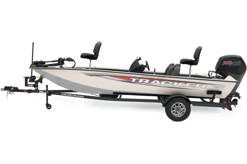 Slide: The Image of 2025 Tracker Pro Team 190 boat, rear view, parked outdoors on a sunny day. - 2