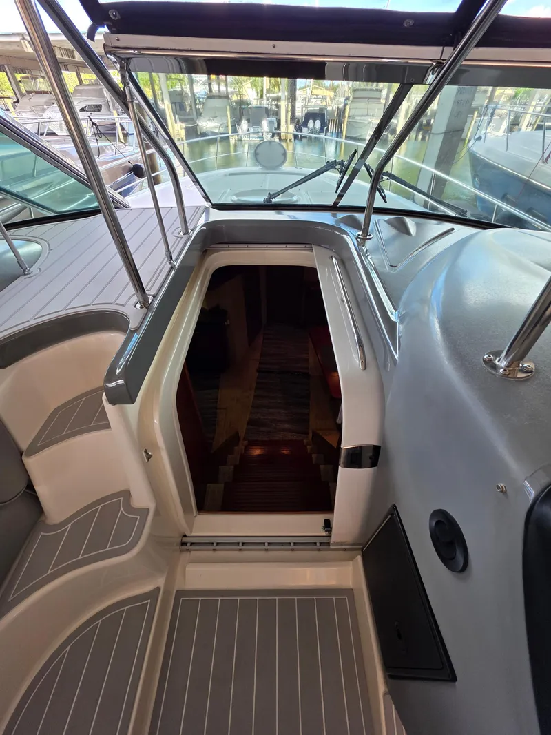 Slide: The Image of 2007 Cruisers Yachts 460 Express interior entrance with sleek design and modern features. - 17