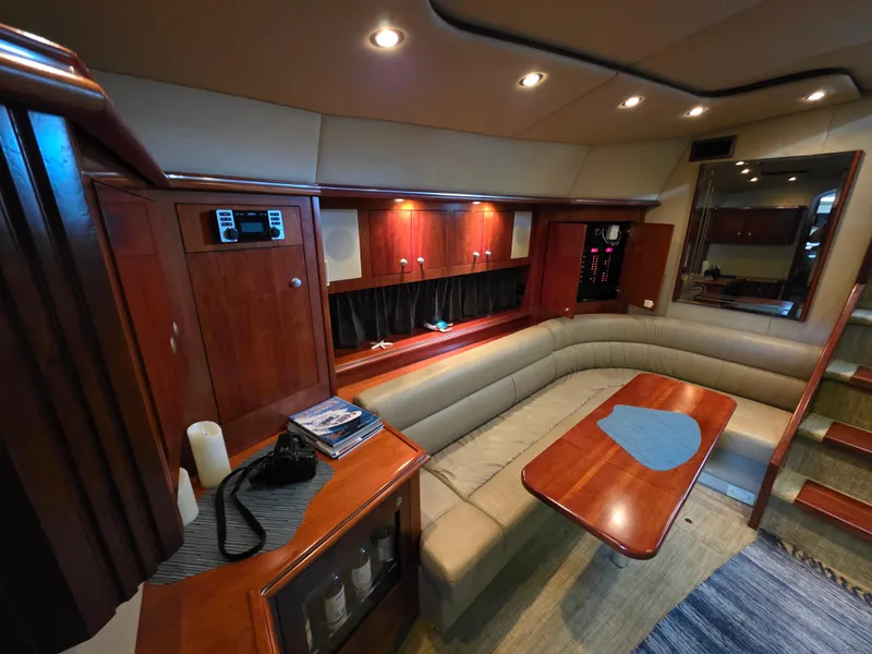 Slide: The Image of Luxurious interior of 2007 Cruisers Yachts 460 Express with elegant wood finishes. - 19