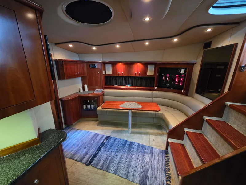 Slide: The Image of Luxurious interior of 2007 Cruisers Yachts 460 Express with elegant wood finishes. - 20