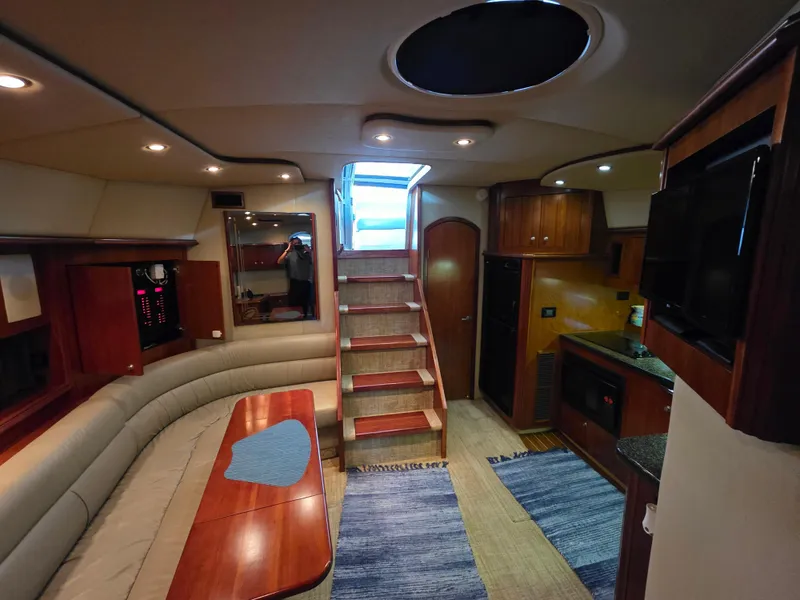 Slide: The Image of Luxurious interior of 2007 Cruisers Yachts 460 Express with elegant seating and modern amenities. - 23