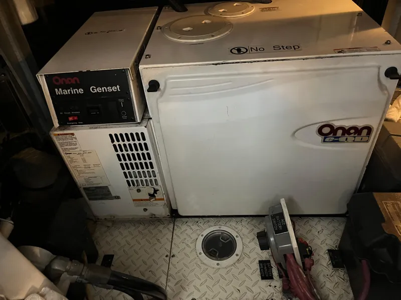 Slide: The Image of Onan Marine Genset in 2007 Cruisers Yachts 460 Express engine room. - 31