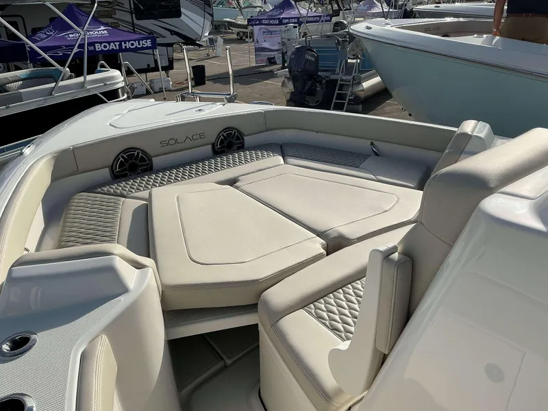 Slide: The Image of 2025 Solace 28 HCS boat interior with luxurious seating and modern design. - 5