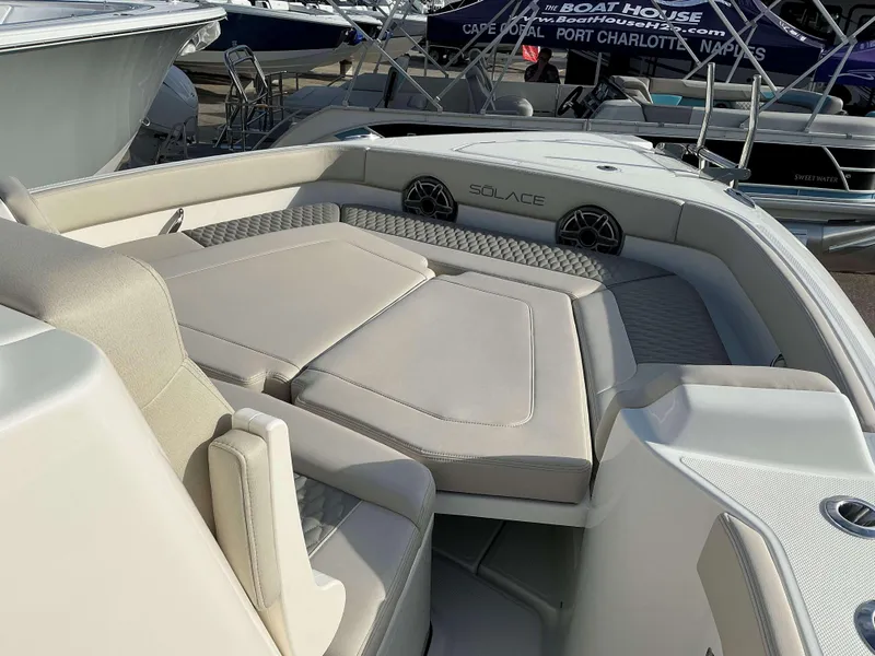 Slide: The Image of 2025 Solace 28 HCS boat interior with luxurious seating and modern design. - 6