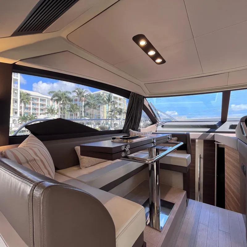 Slide: The Image of Luxurious interior of 2015 Azimut 50 Fly yacht with elegant seating and panoramic windows. - 11