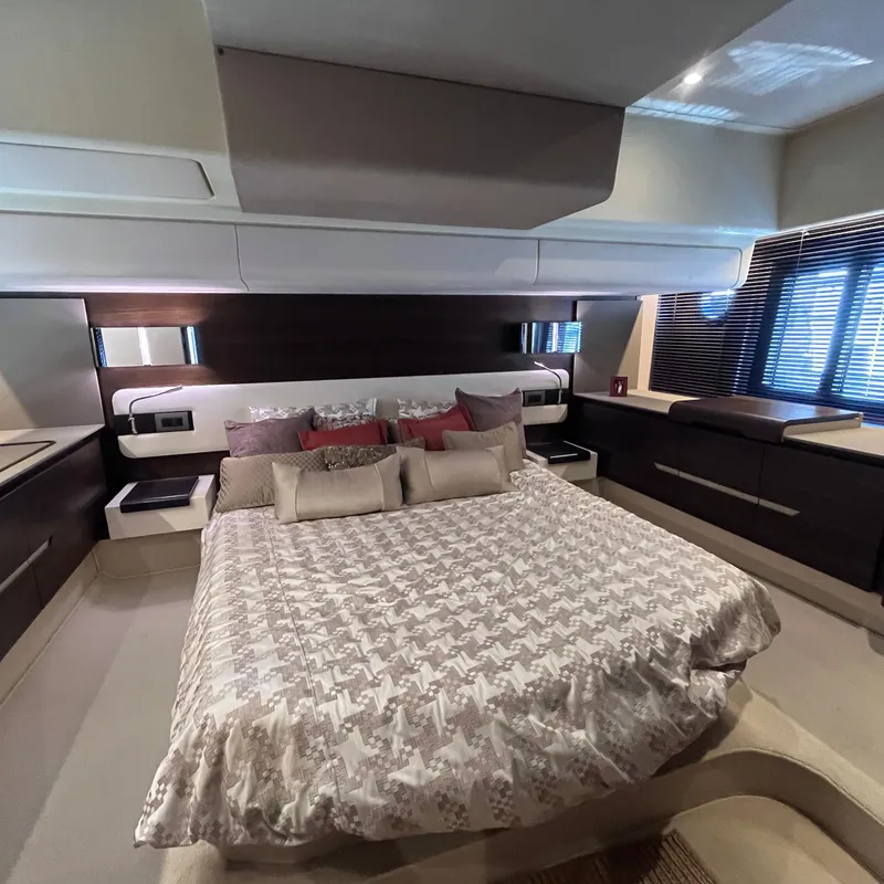 Slide: The Image of Luxurious bedroom interior of 2015 Azimut 50 Fly yacht with elegant bedding and modern design. - 19