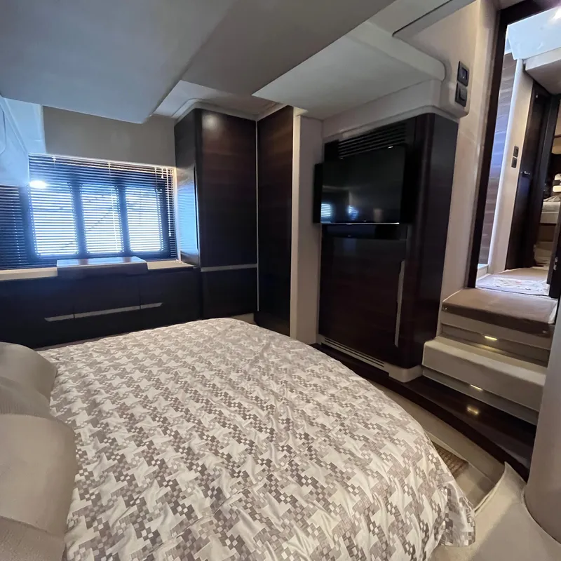Slide: The Image of Luxurious bedroom interior of 2015 Azimut 50 Fly yacht with modern decor and TV. - 21