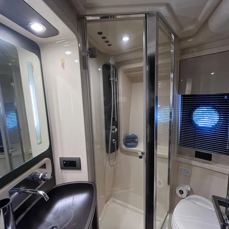 Slide: The Image of Luxurious bathroom interior of 2015 Azimut 50 Fly yacht with modern fixtures and shower. - 25