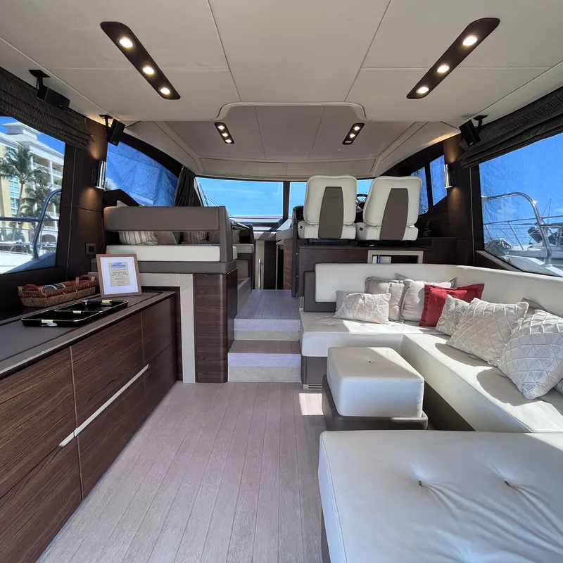 Slide: The Image of Luxurious interior of a 2015 Azimut 50 Fly yacht with modern furnishings and elegant design. - 7