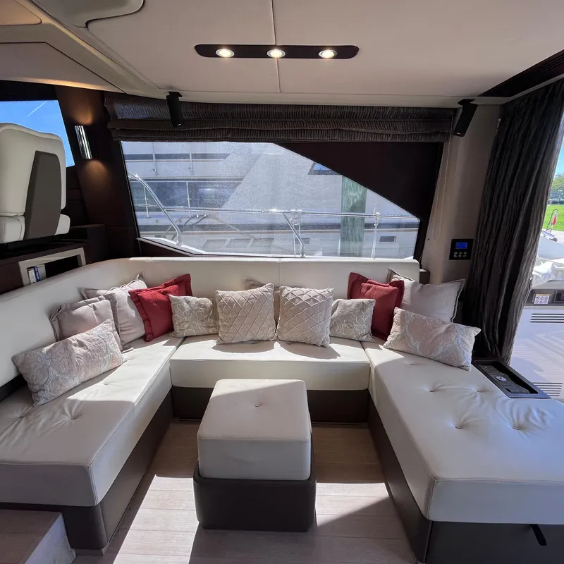 Slide: The Image of Luxurious interior of 2015 Azimut 50 Fly yacht with elegant seating and cushions. - 9