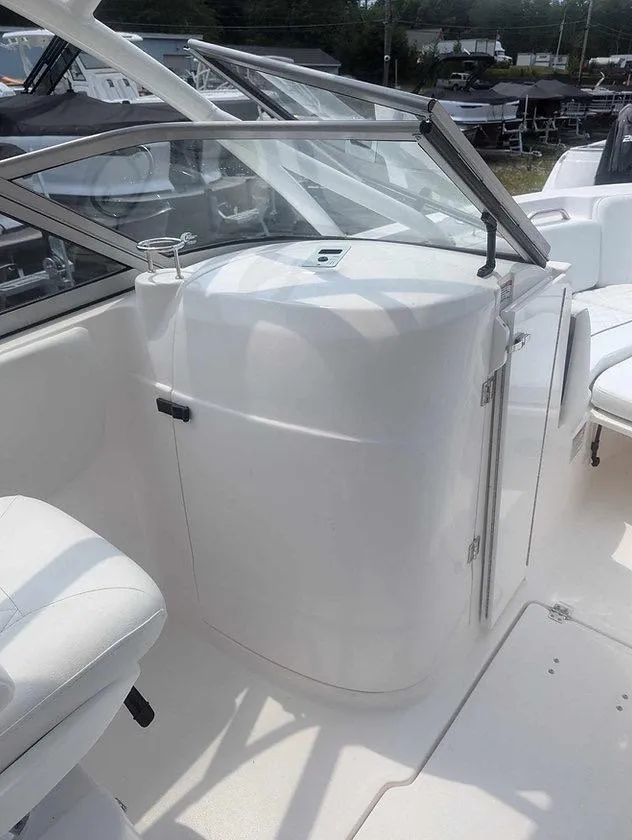 Slide: The Image of 2025 Sea Fox 228 Traveler boat interior with sleek white console design. - 4