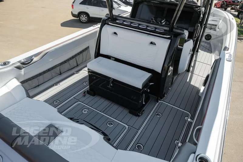 Slide: The Image of 2025 Nor-Tech 340 Sport boat interior with sleek seating and modern design. - 22