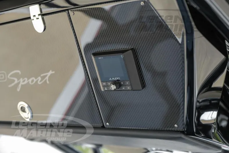 Slide: The Image of 2025 Nor-Tech 340 Sport boat interior with speakers and sleek design. - 36
