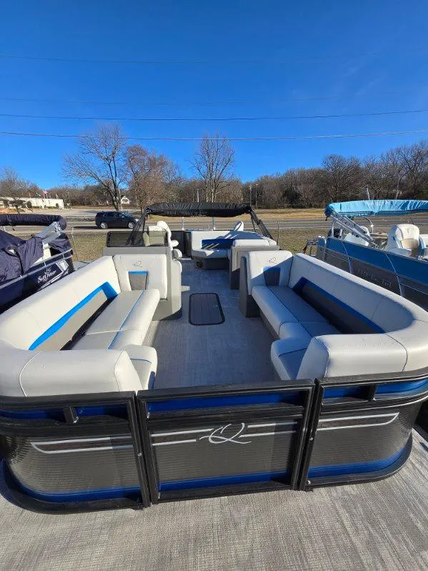Slide: The Image of 2025 Qwest E-CLASS 22 XRE CRUISE pontoon boat with spacious seating and modern design. - 4