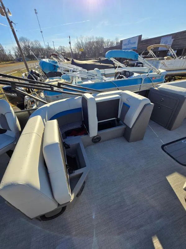 Slide: The Image of 2025 Qwest E-CLASS 22 XRE CRUISE pontoon boat interior with seating and storage. - 7