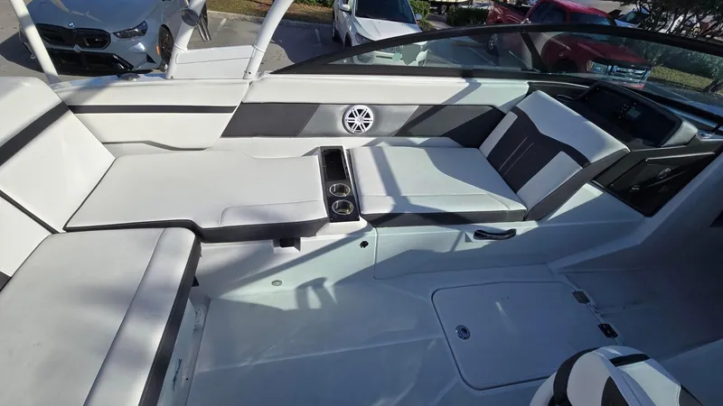 Slide: The Image of 2023 Monterey M225 boat interior with sleek seating and modern design. - 5