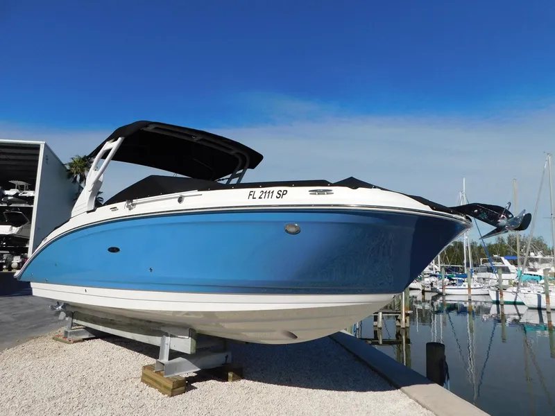 Slide: The Image of 2020 Sea Ray SDX 270 Outboard boat in marina setting. - 0