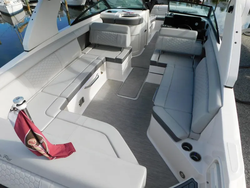 Slide: The Image of 2020 Sea Ray SDX 270 Outboard boat interior with spacious seating and modern design. - 15