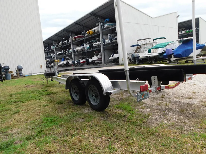 Slide: The Image of Boat trailer near storage facility, suitable for 2020 Sea Ray SDX 270 Outboard. - 20
