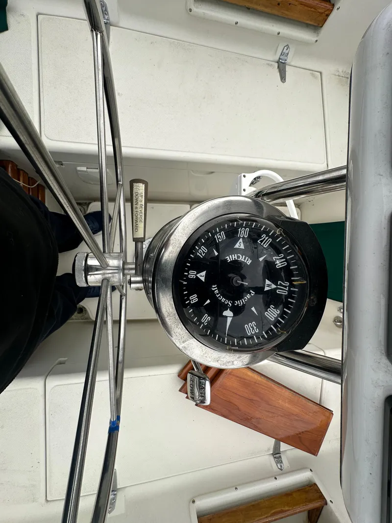 Slide: The Image of Compass on 1998 Pacific Seacraft Cutter sailboat, cockpit view. - 21