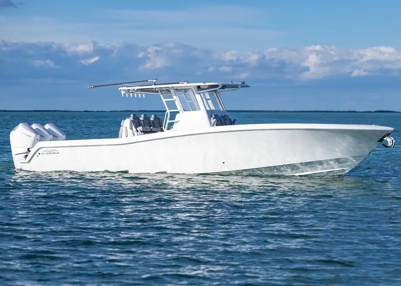 Slide: The Image of 2025 Invincible 39 Open Fisherman boat cruising on calm blue waters. - 1