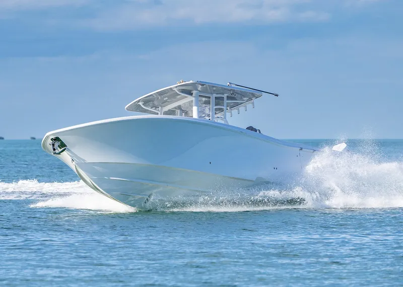 Slide: The Image of 2025 Invincible 39 Open Fisherman boat cruising on the ocean. - 2